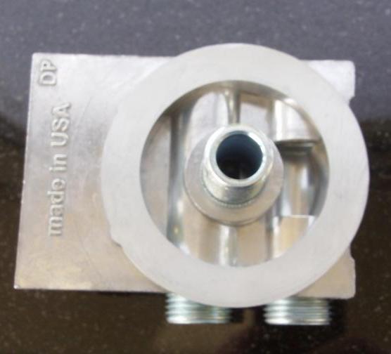 Externí relokační držák olejového filtru Mocal - 2x vývody 1/2"-NPT na každé straně